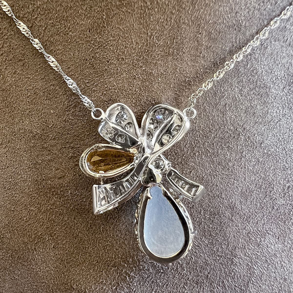 Vintage Moonstone, Topaz & Diamond Pendant sold by Doyle and Doyle an antique and vintage jewelry boutique