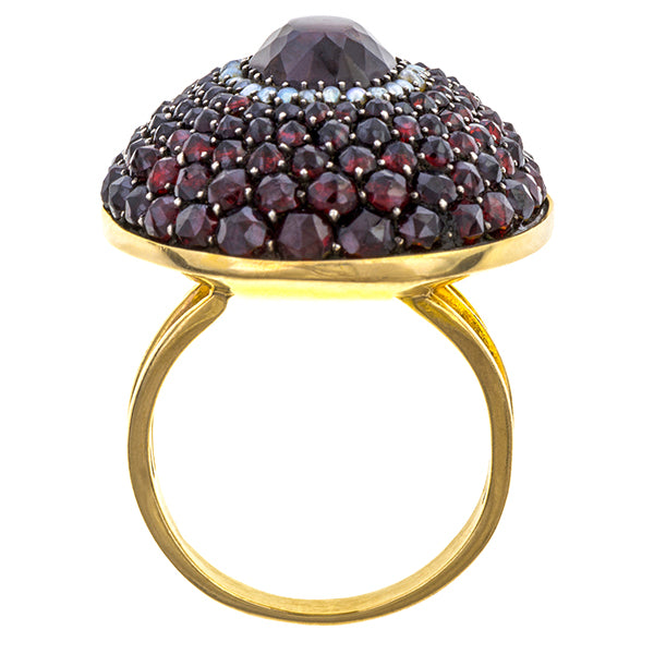 Antique ring: A Yellow Gold Bohemian Garnet And Pearl Ring sold by Doyle & Doyle vintage and antique jewelry boutique.