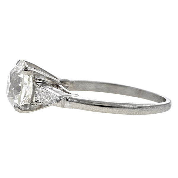 Vintage ring: a Platinum Old European And Baguette Cut Diamond Engagement Ring sold by Doyle & Doyle vintage and antique jewelry boutique.