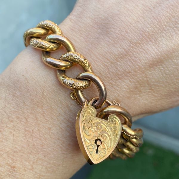 9ct Yellow Gold with 9ct White Gold Heart Charm Bracelet