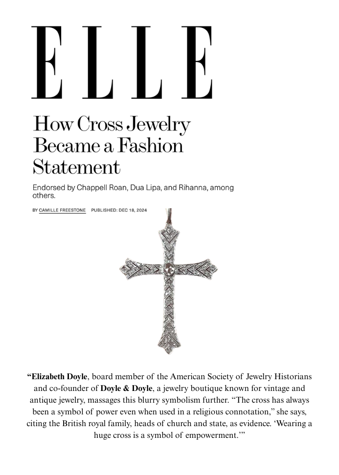 This image shows an article from Elle about how cross jewelry has becoem a fashion statement embraced by celebrities. It shows an antique rose cut diamond cross pencant.