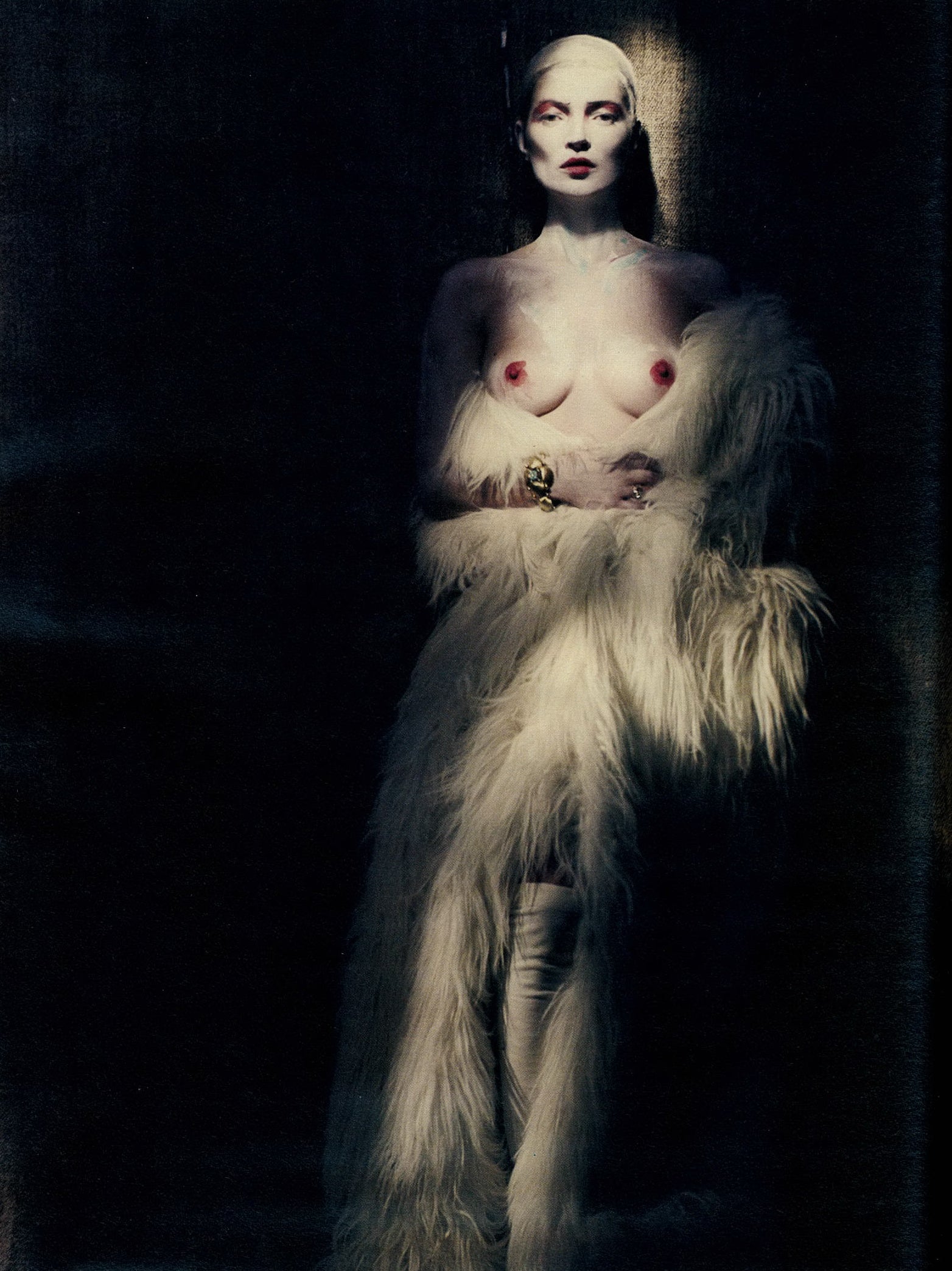 This image depicts kate moss  in a fashion shoot in w magazine