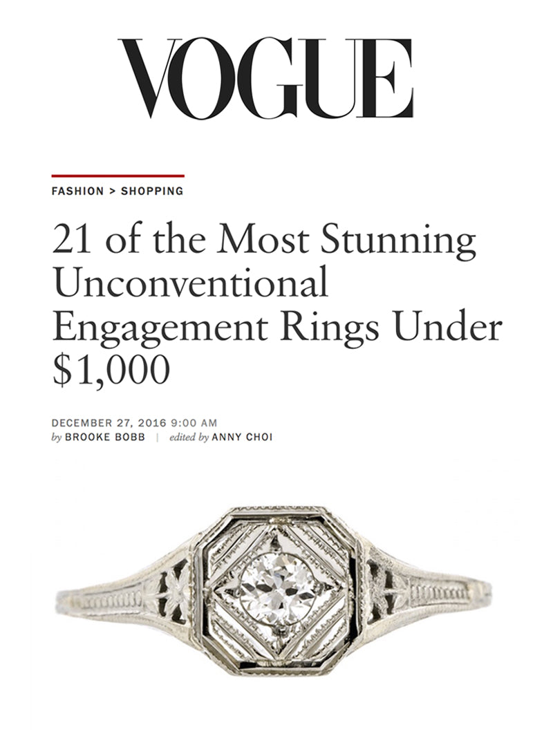 This image shows a vintage engagement ring featured in a Vogue article about affordable unconventional engagement rings.