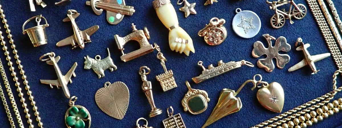 Explore Doyle & Doyle's collection of vintage charms, pendants, and chains
