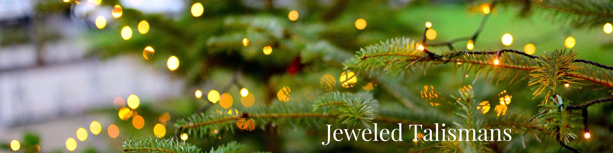 Antique and vintage jewelry talismans and symbolic jewelry, including snake and heart jewelry. From Doyle & Doyle in New York.