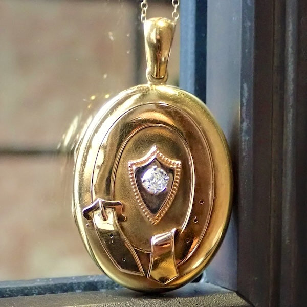 Antique Victorian Diamond Gold Locket with garter motif, from Doyle & Doyle vintage and antique jewelry