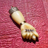 Vintage Figa Charm sold by Doyle and Doyle an antique and vintage jewelry boutique