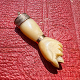 Vintage Figa Charm sold by Doyle and Doyle an antique and vintage jewelry boutique