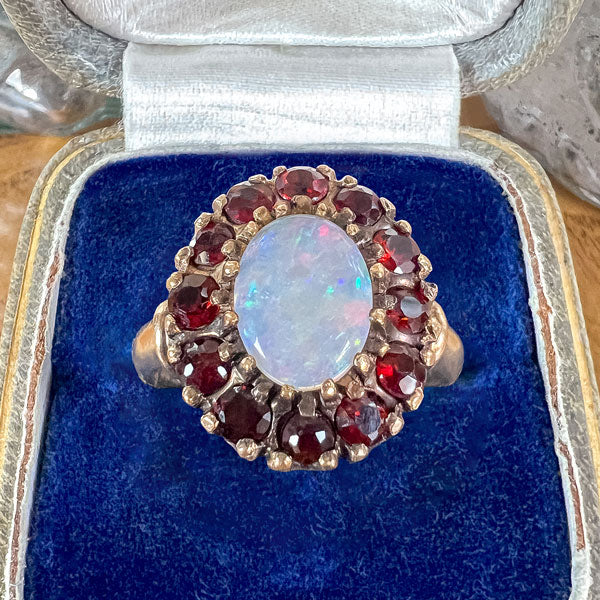 Vintage Opal & Garnet Ring sold by Doyle and Doyle an antique and vintage jewelry boutique
