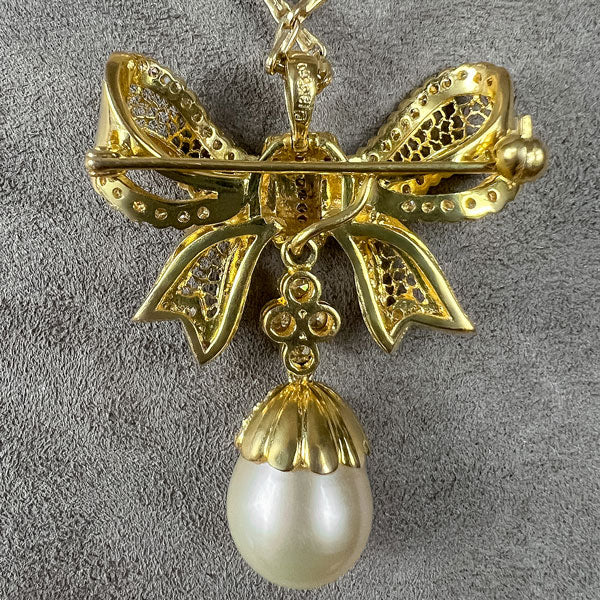 Vintage Diamond & Pearl Drop Bow Pendant sold by Doyle and Doyle an antique and vintage jewelry boutique