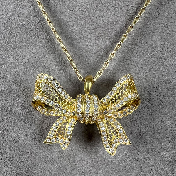 Vintage Diamond & Pearl Drop Bow Pendant sold by Doyle and Doyle an antique and vintage jewelry boutique