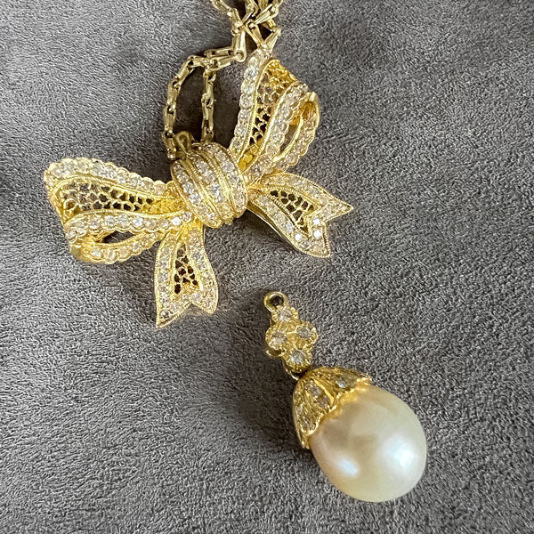 Vintage Diamond & Pearl Drop Bow Pendant sold by Doyle and Doyle an antique and vintage jewelry boutique