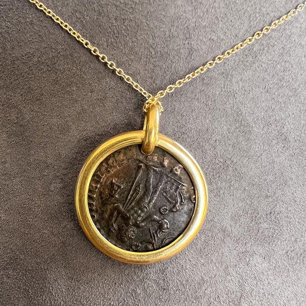 Vintage Coin Pendant sold by Doyle and Doyle an antique and vintage jewelry boutique
