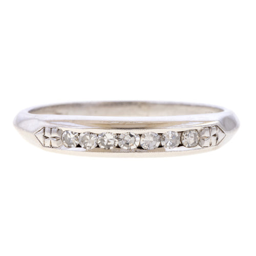 Vintage Channel Set Diamond Wedding Band sold by Doyle and Doyle an antique and vintage jewelry boutique