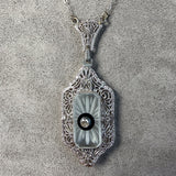 Filigree Diamond, Onyx & Rock Crystal Pendant, sold by Doyle and Doyle an antique and vintage jewelry boutique