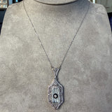 Filigree Diamond, Onyx & Rock Crystal Pendant, sold by Doyle and Doyle an antique and vintage jewelry boutique