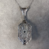 Filigree Diamond, Onyx & Rock Crystal Pendant, sold by Doyle and Doyle an antique and vintage jewelry boutique