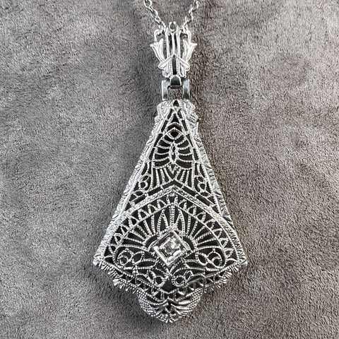 Vintage Filigree Diamond Pendant sold by Doyle and Doyle an antique and vintage jewelry boutique