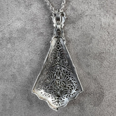 Vintage Filigree Diamond Pendant sold by Doyle and Doyle an antique and vintage jewelry boutique