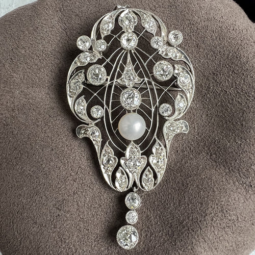 Art Deco Pearl & Diamond Pin/Pendant sold by Doyle and Doyle an antique and vintage jewelry boutique