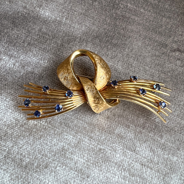 Retro Sapphire Brooch sold by Doyle and Doyle an antique and vintage jewelry boutique