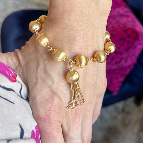 Vintage Gold Bead & Tassel Bracelet sold by Doyle and Doyle an antique and vintage jewelry boutique
