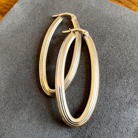 Vintage Ridged Elongate Hoop Earrings sold by Doyle and Doyle an antique and vintage jewelry boutique