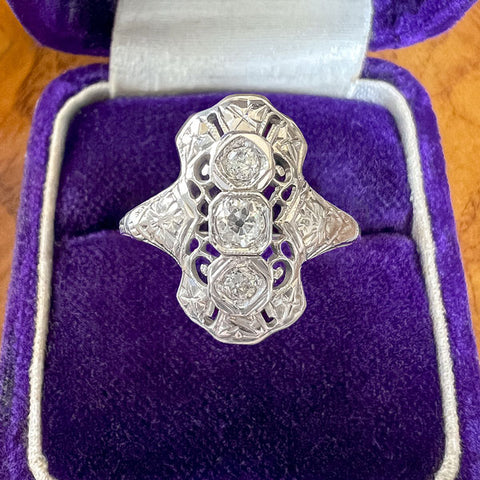 Vintage Filigree Diamond Dinner Ring sold by Doyle and Doyle an antique and vintage jewelry boutique