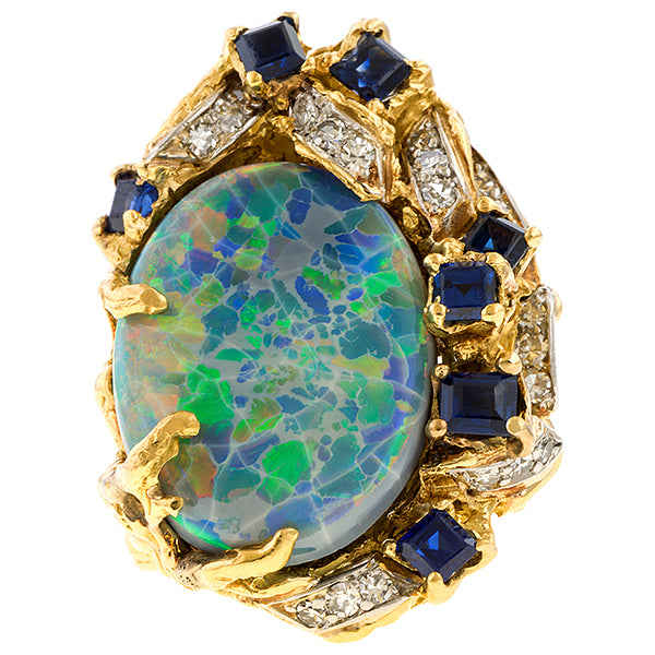 Vintage Arthur King Black Opal Ring with sapphires and diamonds in yellow gold, from Doyle & Doyle antique and vintage jewelry boutique