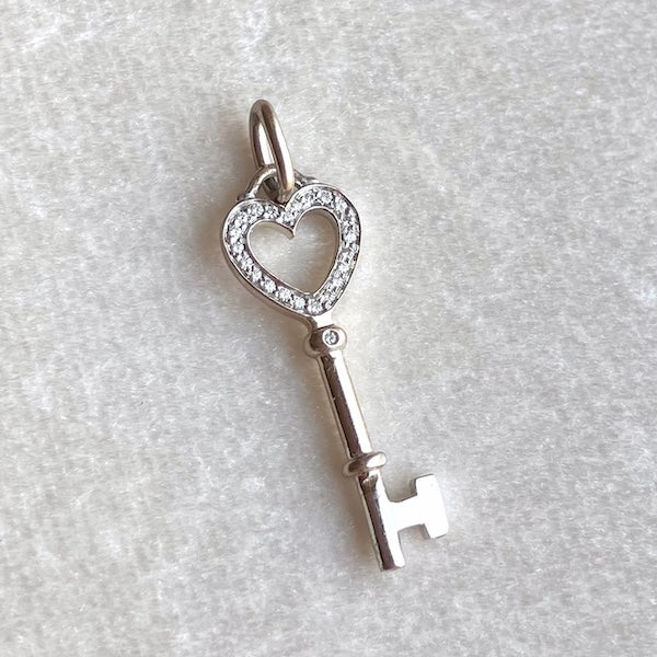 Estate Tiffany & Co. Diamond Mini Key sold by Doyle and Doyle an antique and vintage jewelry boutique