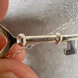 Estate Tiffany & Co. Diamond Mini Key sold by Doyle and Doyle an antique and vintage jewelry boutique