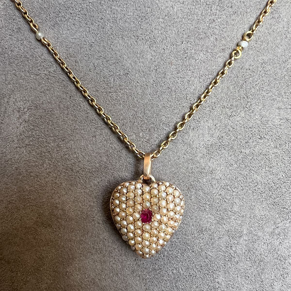 Victorian Ruby & Half Pearl Heart Pendant sold by Doyle and Doyle an antique and vintage jewelry boutique