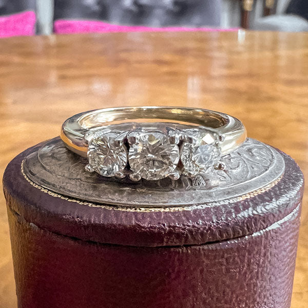 Estate Three Stone Diamond Ring sold by Doyle and Doyle an antique and vintage jewelry boutique