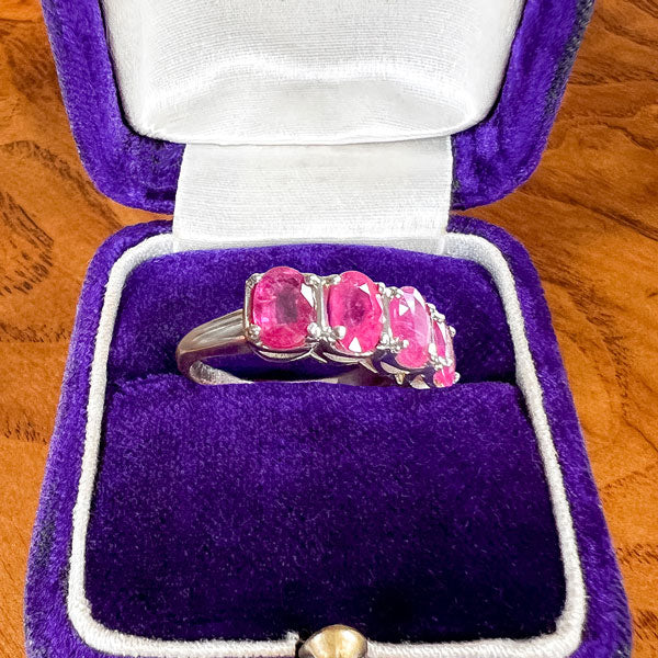 Vintage Four Stone Ruby Ring sold by Doyle and Doyle an antique and vintage jewelry boutique