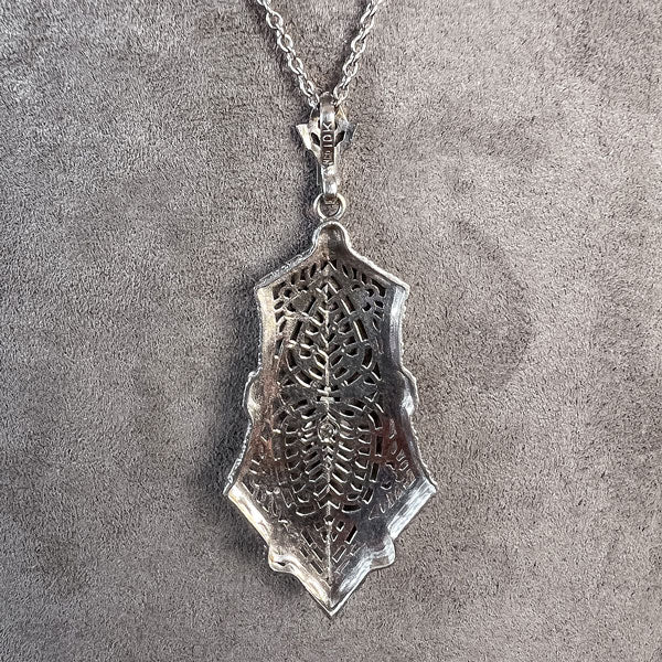 Vintage Filigree Diamond Pendant sold by Doyle and Doyle an antique and vintage jewelry boutique