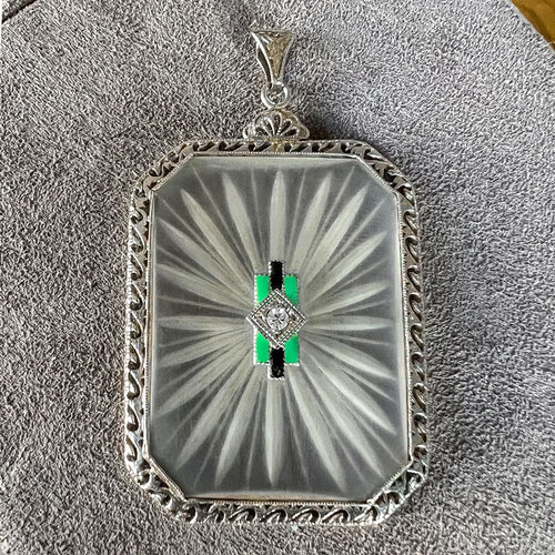 At Deco Rock Crystal Filigree Diamond Pendant sold by Doyle and Doyle an antique and vintage jewelry boutique
