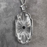 At Deco Rock Crystal Filigree Diamond Pendant, sold by Doyle & Doyle an antique and vintage jewelry boutique