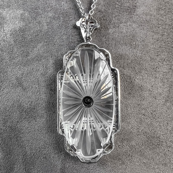 At Deco Rock Crystal Filigree Diamond Pendant, sold by Doyle & Doyle an antique and vintage jewelry boutique