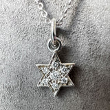 Vintage Diamond Star of David Pendant sold by Doyle and Doyle an antique and vintage jewelry boutique