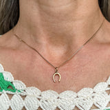 Vintage Horseshoe Charm sold by Doyle and Doyle an antique and vintage jewelry boutique