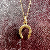Vintage Horseshoe Charm sold by Doyle and Doyle an antique and vintage jewelry boutique