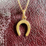 Vintage Horseshoe Charm sold by Doyle and Doyle an antique and vintage jewelry boutique