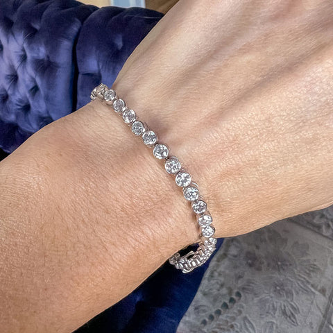 Estate Diamond Bezel Tennis Bracelet sold by Doyle and Doyle an antique and vintage jewelry boutique