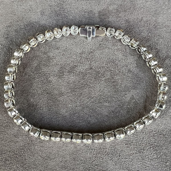 Estate Diamond Bezel Tennis Bracelet sold by Doyle and Doyle an antique and vintage jewelry boutique