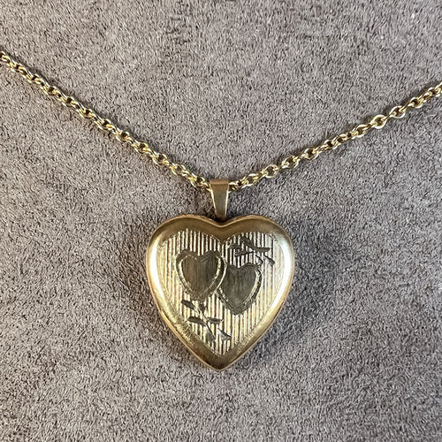 Vintage Heart Locket sold by Doyle and Doyle an antique and vintage jewelry boutique
