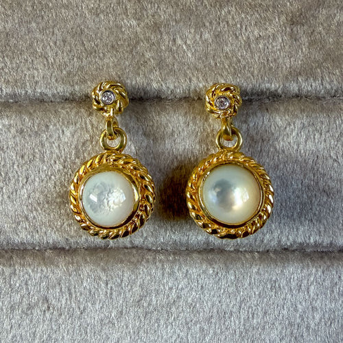 Vintage Mother of Pearl Drop Earrings sold by Doyle and Doyle an antique and vintage jewelry boutique