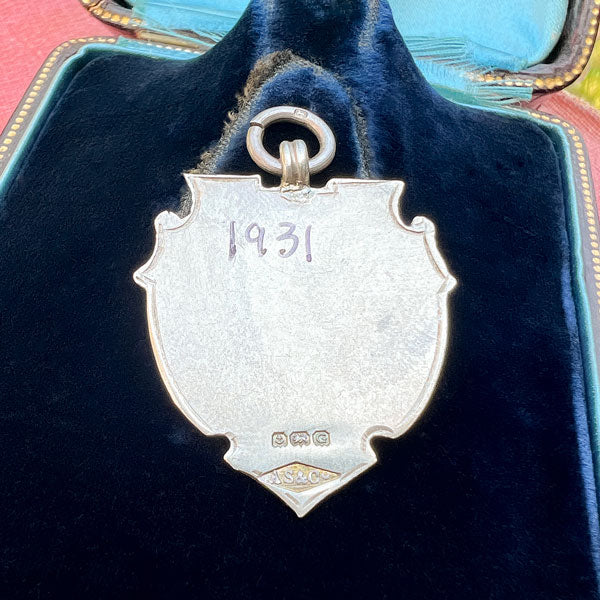 Vintage Silver Track & Field Medal, 1931 sold by Doyle and Doyle an antique and vintage jewelry boutique
