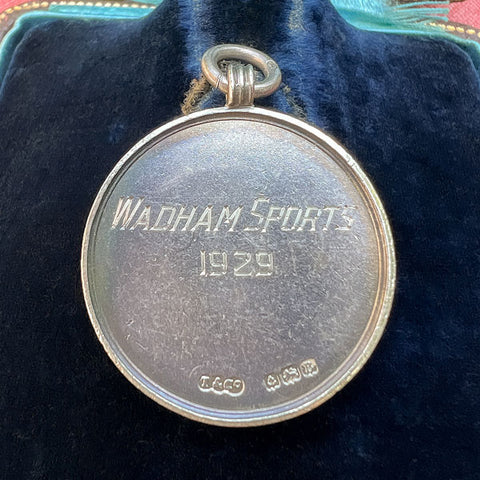 Vintage Art Deco Silver Track & Field High Jump Medal, 1929 sold by Doyle and Doyle an antique and vintage jewelry boutique