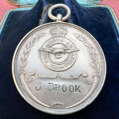 Antique Art Deco Royal Air Force Silver Track Medal, 1925 sold by Doyle and Doyle an antique and vintage jewelry boutique