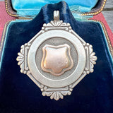 Antique Silver Fancy Medallion Fob, 1921 sold by Doyle and Doyle an antique and vintage jewelry boutique